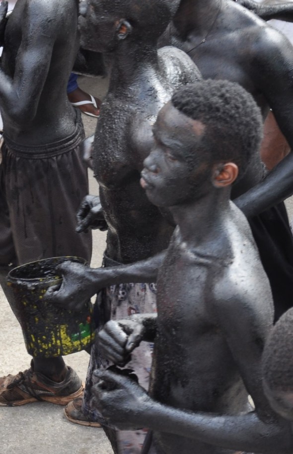 The scariest characters are the "Lanset Kod" - covered in charcoal dust and cane syrup they run amok through the crowds smearing as many people as possible with their gunk