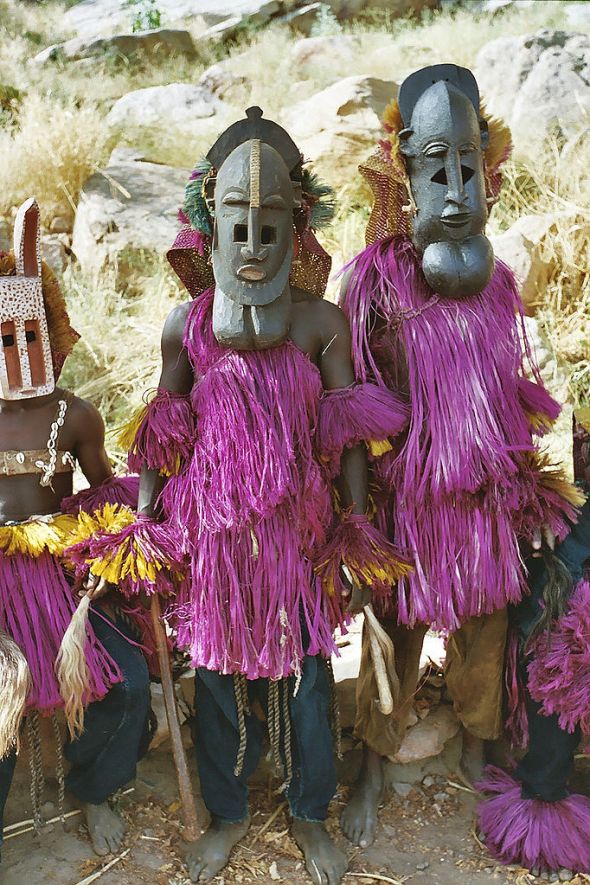 Dogon masked dancers by Devriese reproduced under the terms of the Creative Commons Licence CC BY 3.0