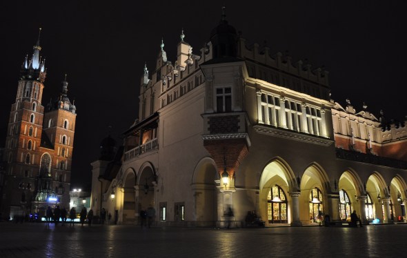 The twin towers of St Wojciech's church next to the Renaissance-era Cloth Hall
