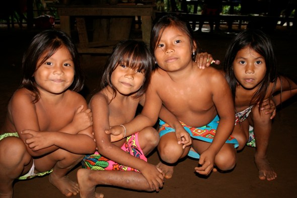 THE VILLAGE KIDS POSE FOR A PICTURE