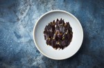 Mousse made from dulse, crystallized dark chocolate, fermented blueberries and leafs made from dried blueberries. KOKS –&nbsp;Copy